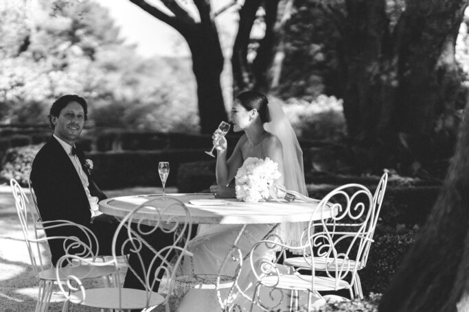 couple drinking champagne at table Bastide Du Roy
