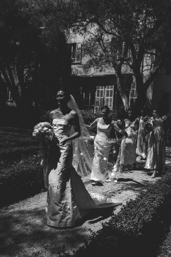bride and bridesmaids walking