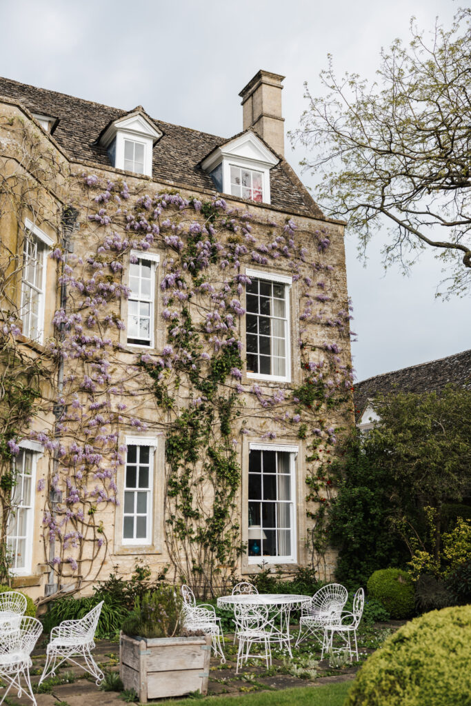 Cornwell manor gardens wisteria growing up house