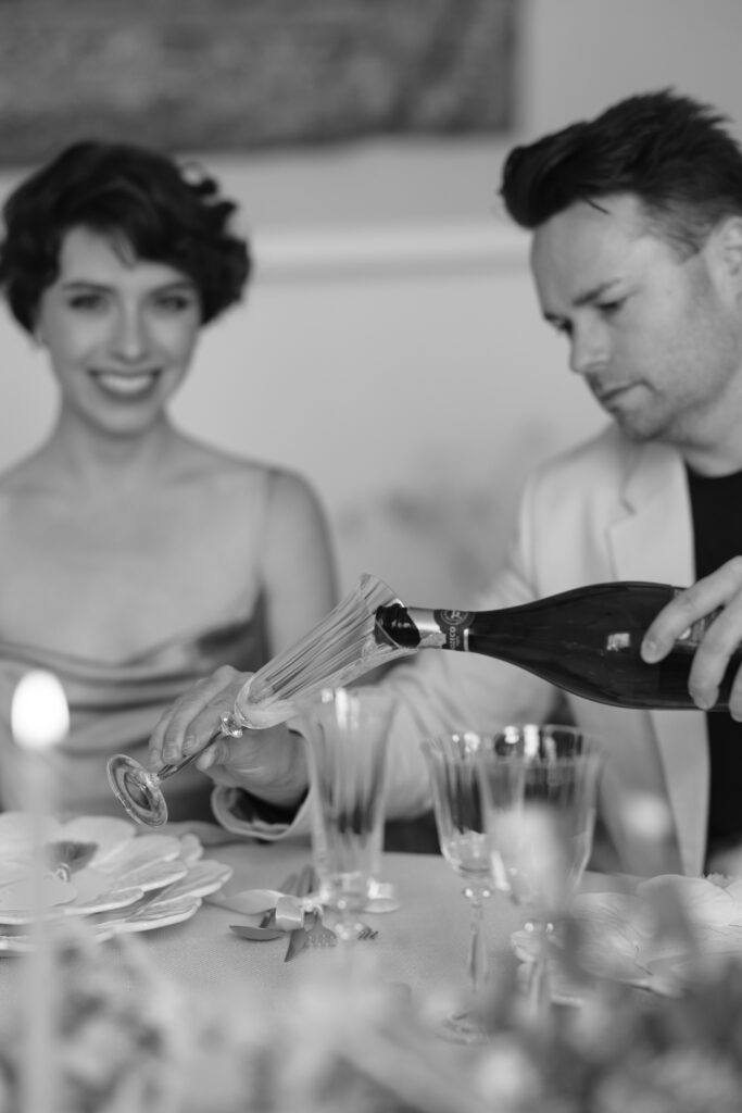 photo of champagne glasses toasting