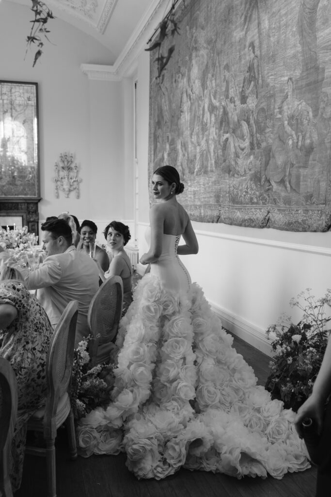 black and white photo of bride wearing Savin london dress