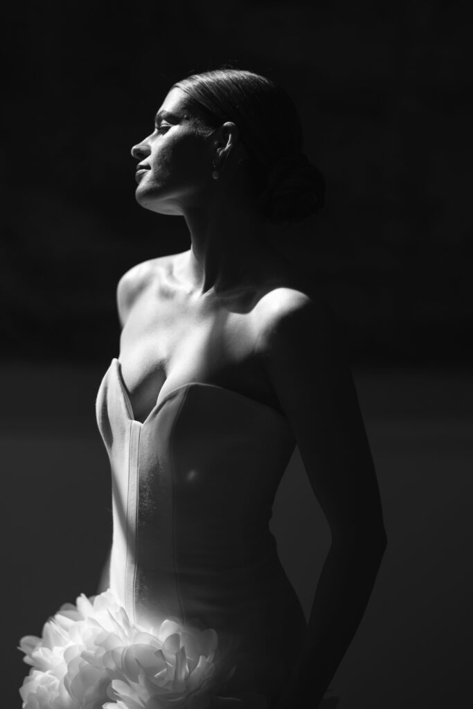 black and white photo of bride in light