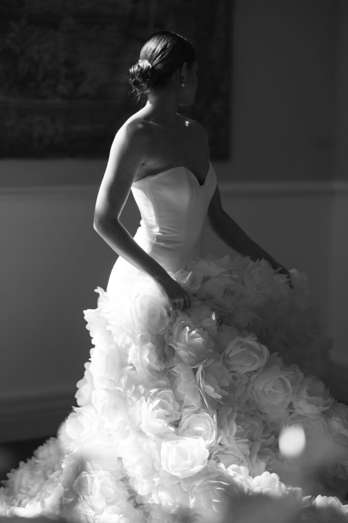 black and white photo of bride in light