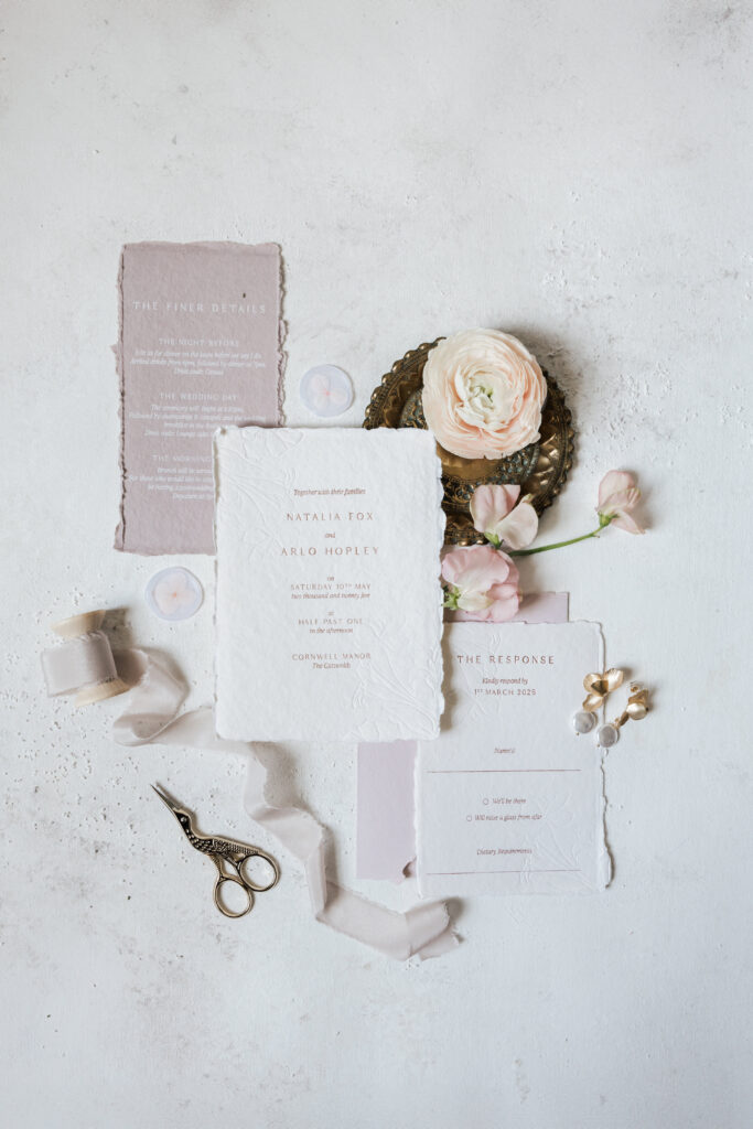 pale lilac wedding stationery flatlay