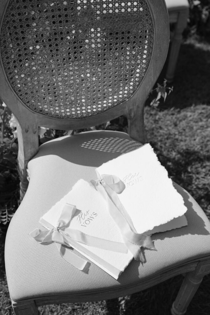 wedding vow books on chair