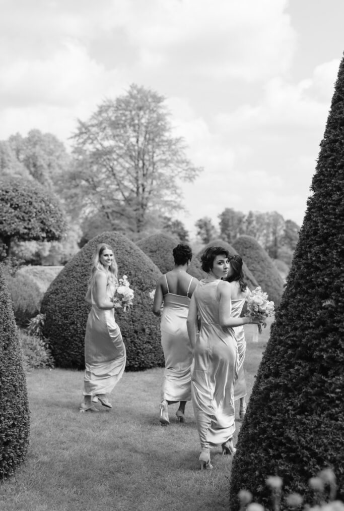 bridesmaids walking together and bridesmaids  looking over the shoulder