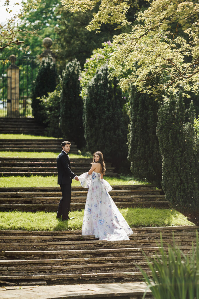 bride and groom on steps at Cornwell Manor