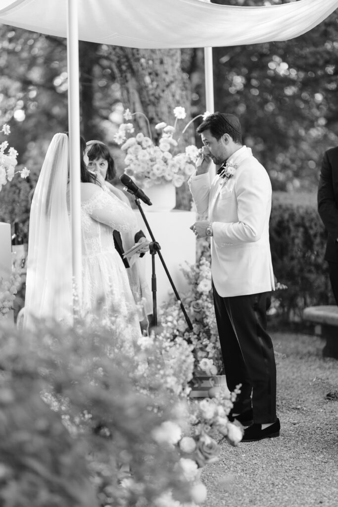 groom crying at alter