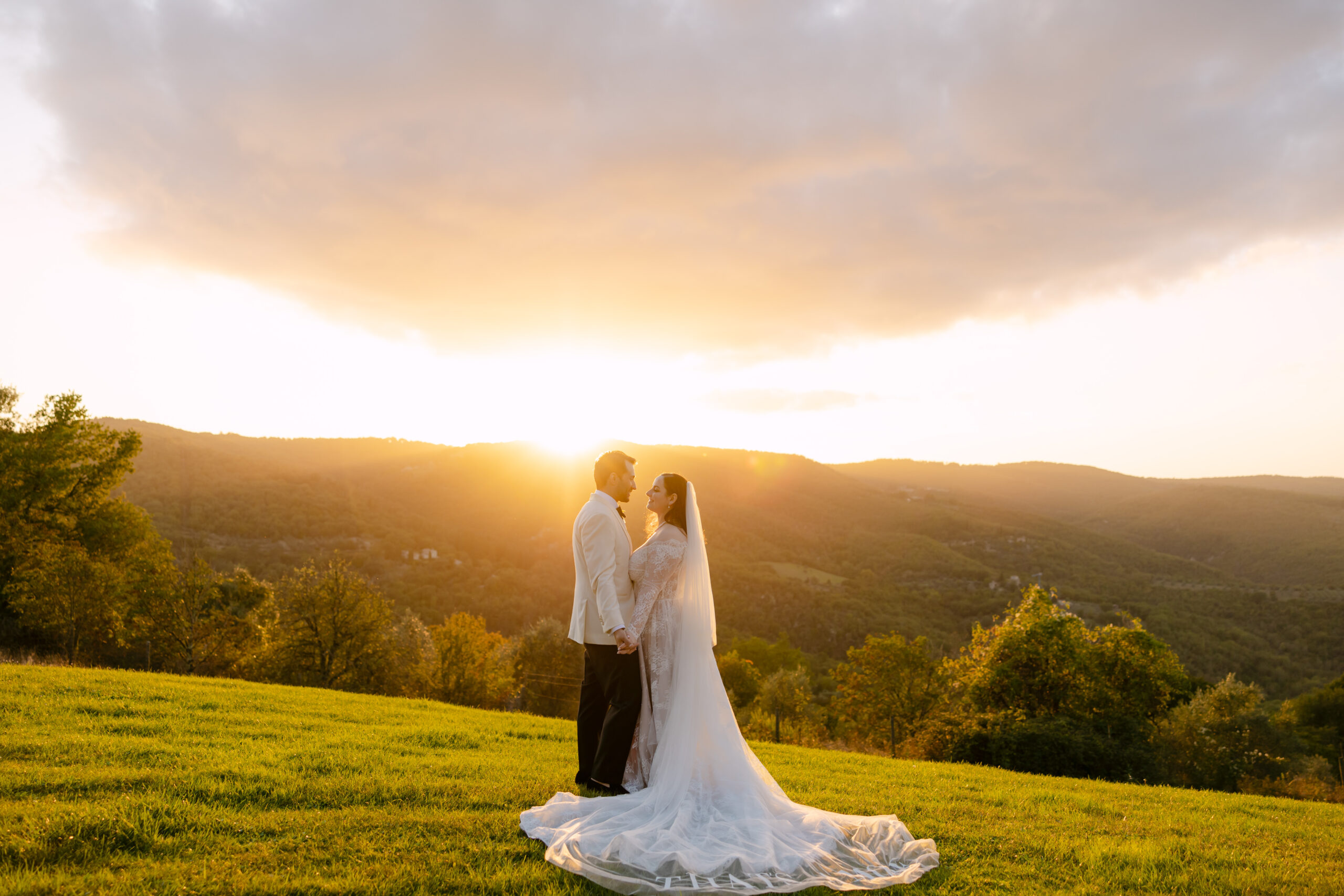 bride and groom at sunset