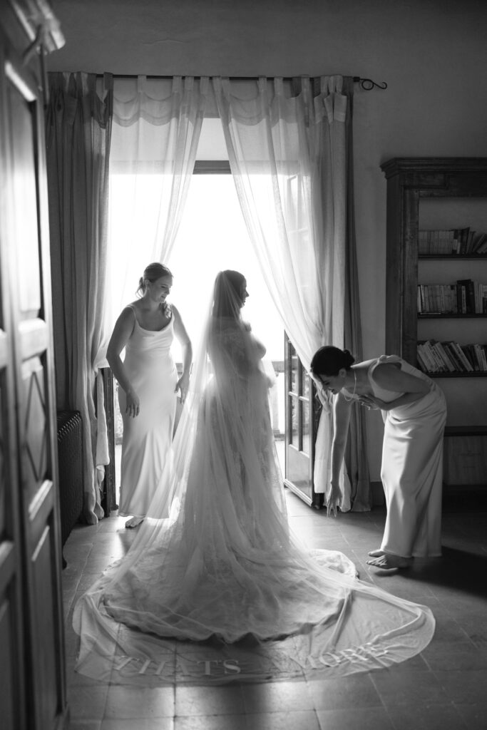 silouette photo of bride and bridesmaids