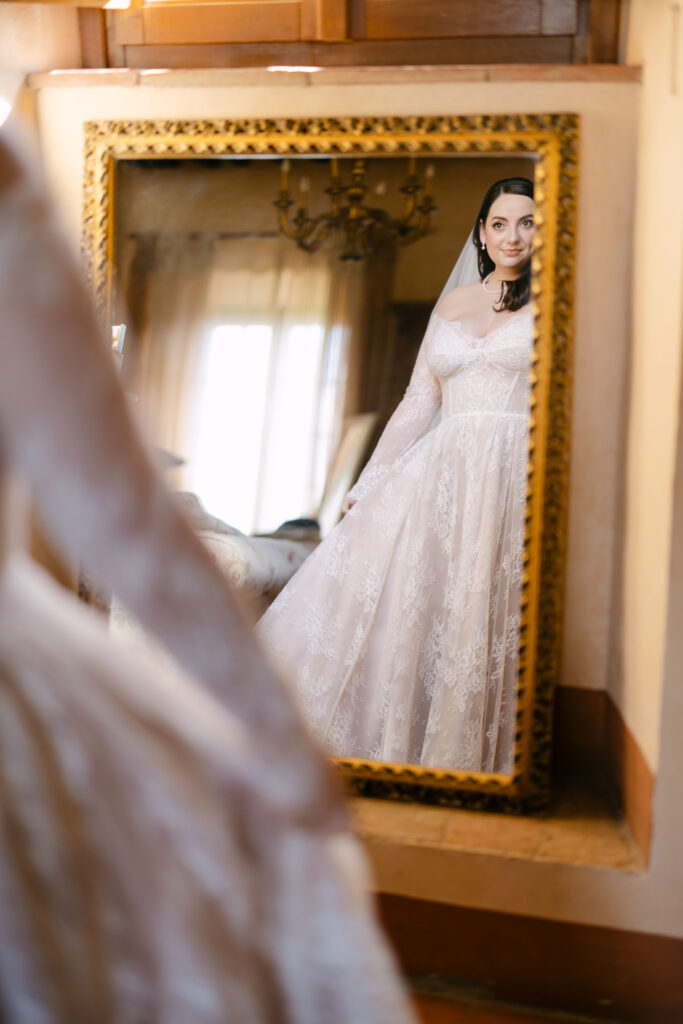 bride looking in the mirror