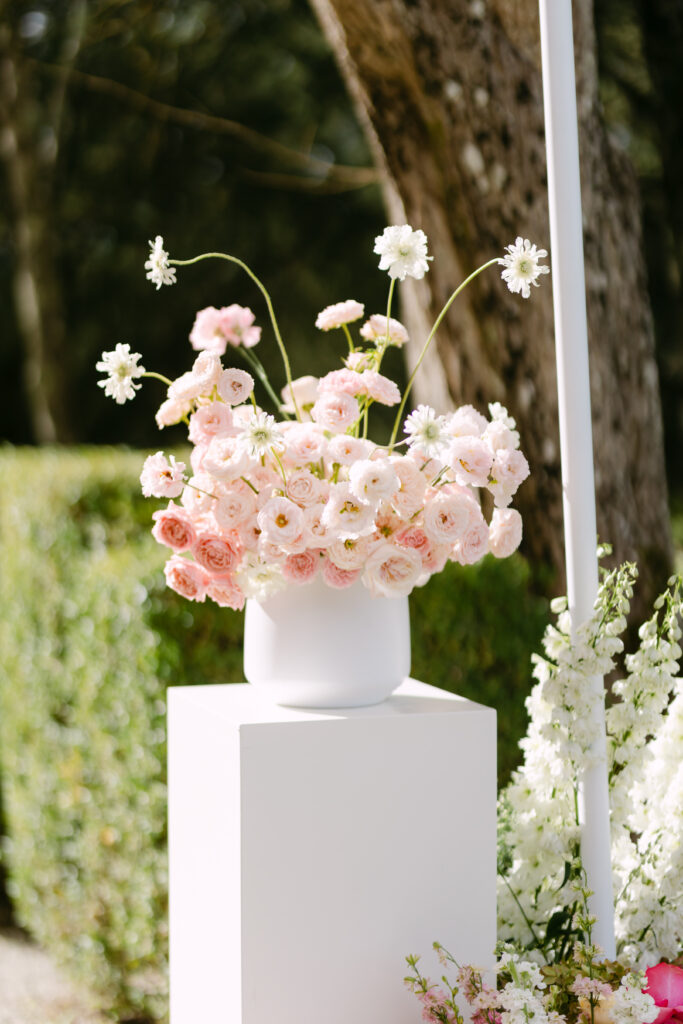 pale pink floral arrangement at wedding