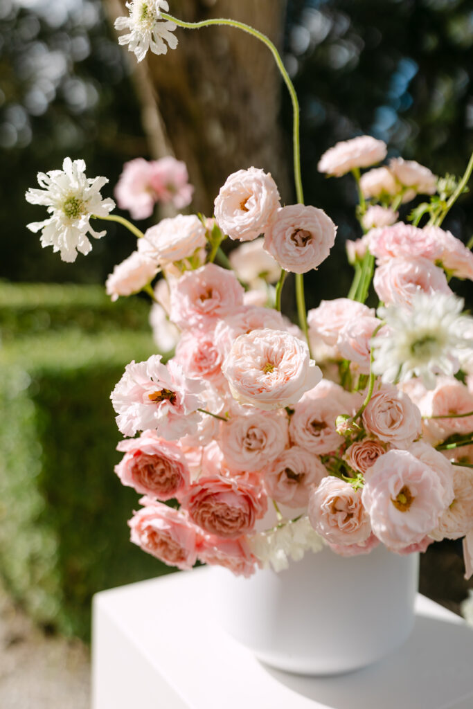 pale pink floral arrangement at wedding