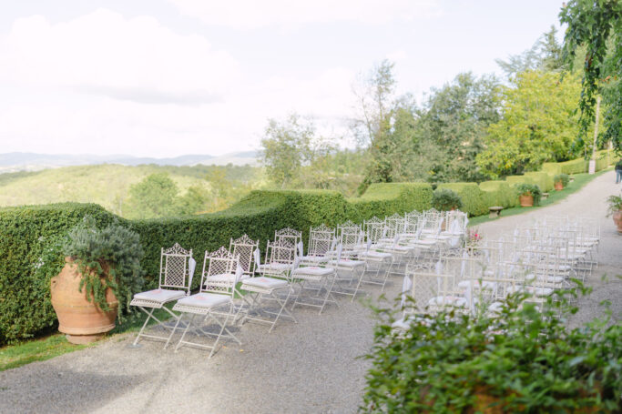 white metal wedding chairs