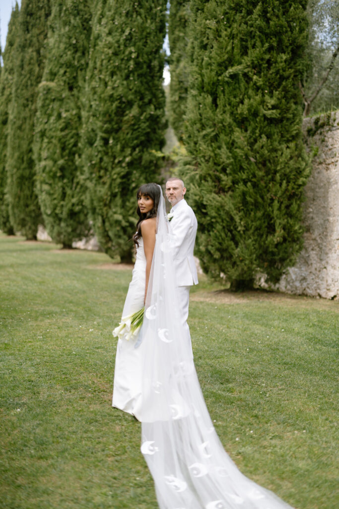 bride and groom walking holding hands