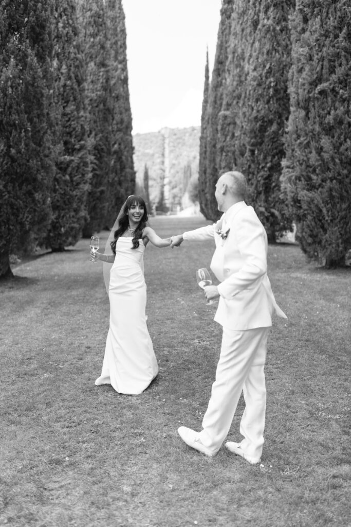 bride and groom walking holding hands