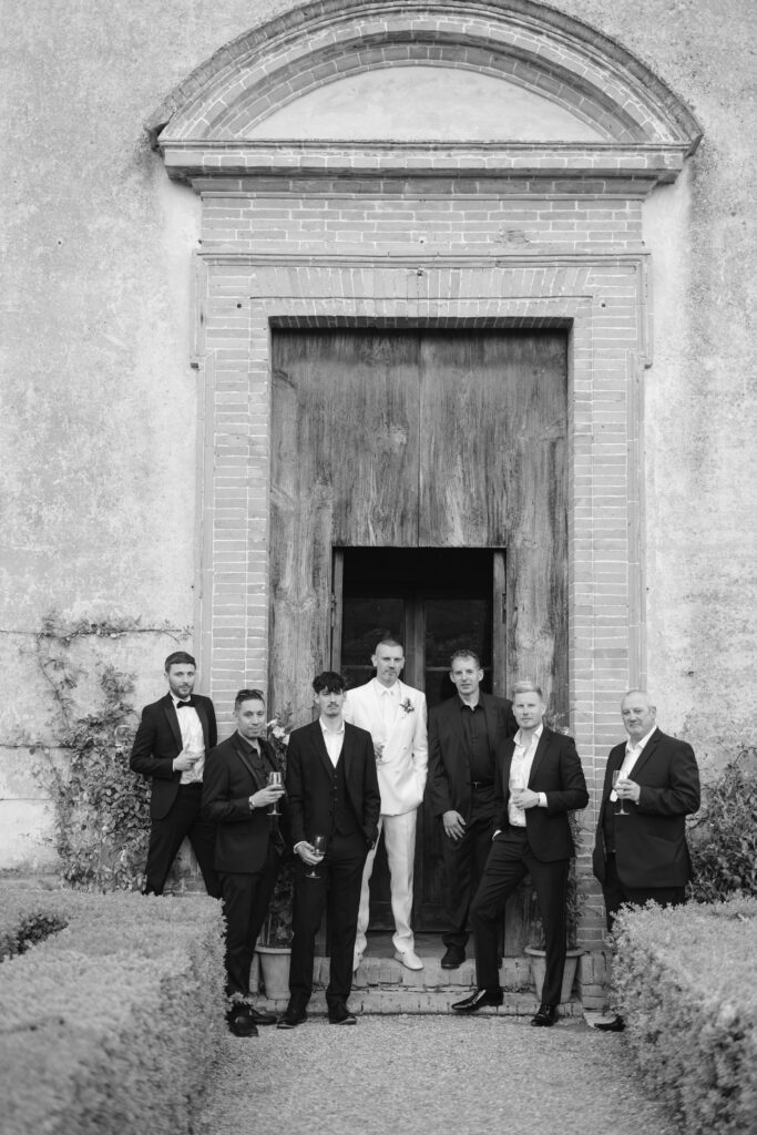 group shot infront of chapel