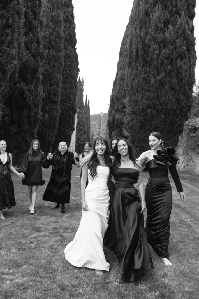 group walking on grass at villa cetinale