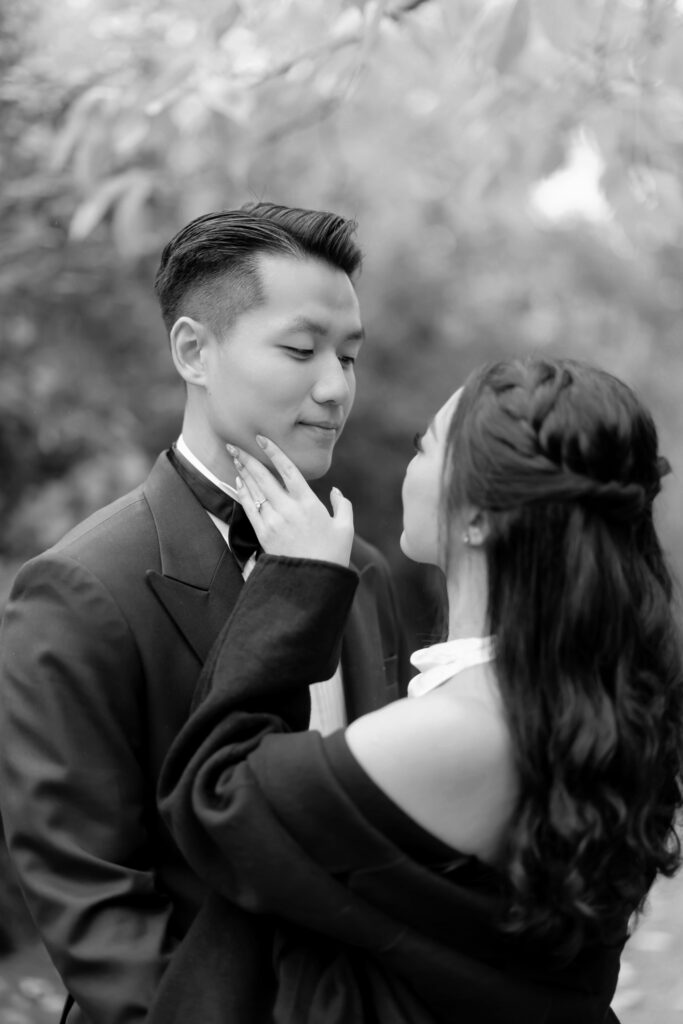 A man and woman looking at each other.